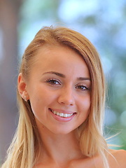 Linda Chase flaunts her slender, nubile body and smooth pussy on the table.