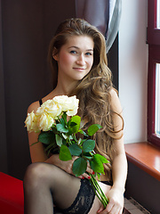 Always smiling, always showing secret look. This slender nude cutie looks amazingly good in that sexy black underwear.