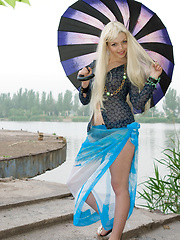 When nobody is on the lake shore, this stunning blonde takes advantage over natural beauties as her loveliness take over watchers breath.