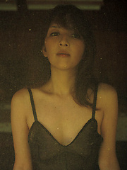 Neo Asian babe in white dress loves feeling her body in water