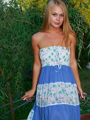 Beautifully tanned Sarika A plays around in her sun dress before taking it off to reveal her sexy bits.