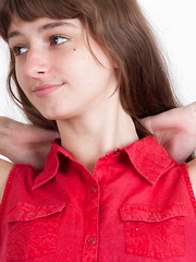 Willow removes her denim jeans to masturbate